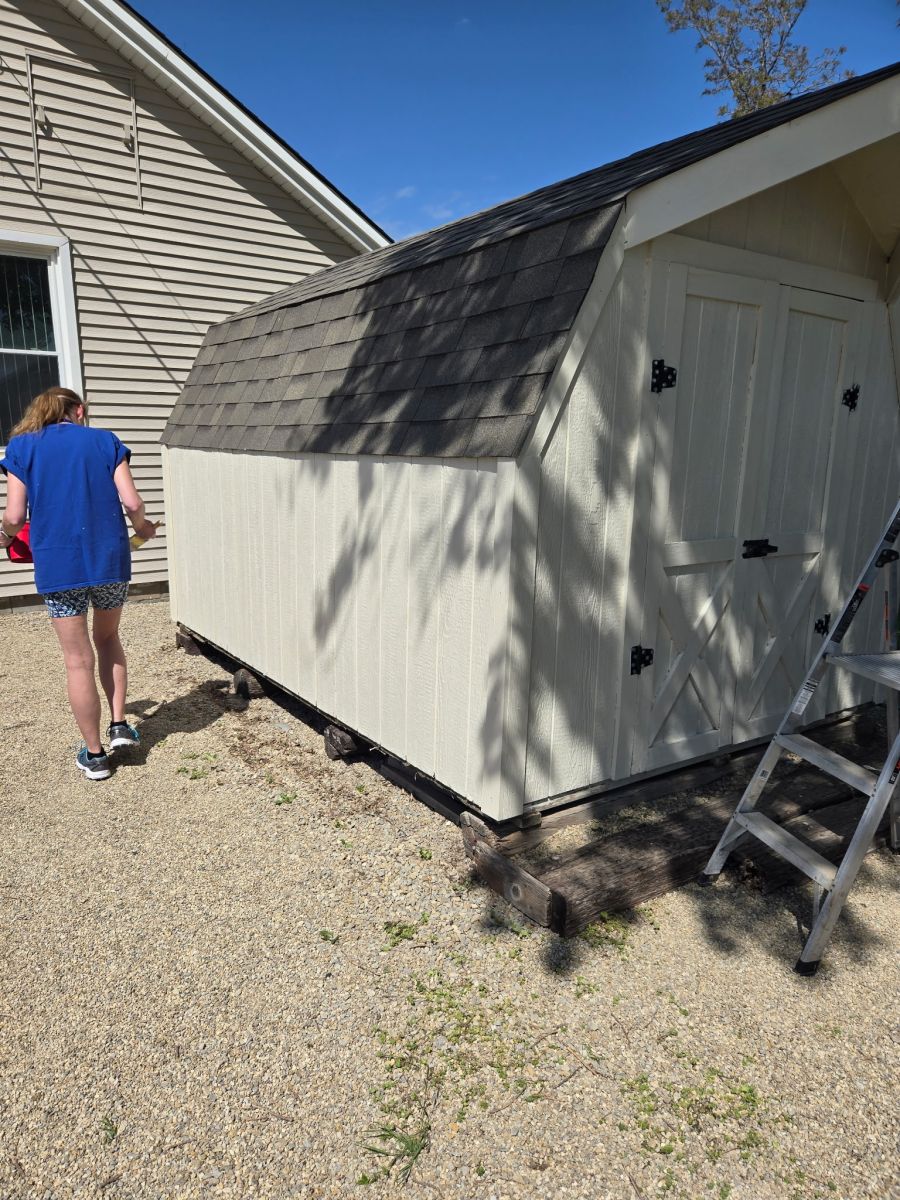 Sunbelt Solomon Volunteers Paint Friendship Center Shed 2