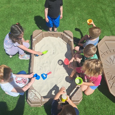 Children playing in sandbox at Early Learning Center