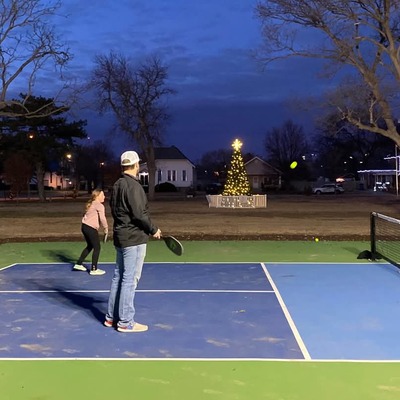 People playing pickle ball on the new pickle ball court