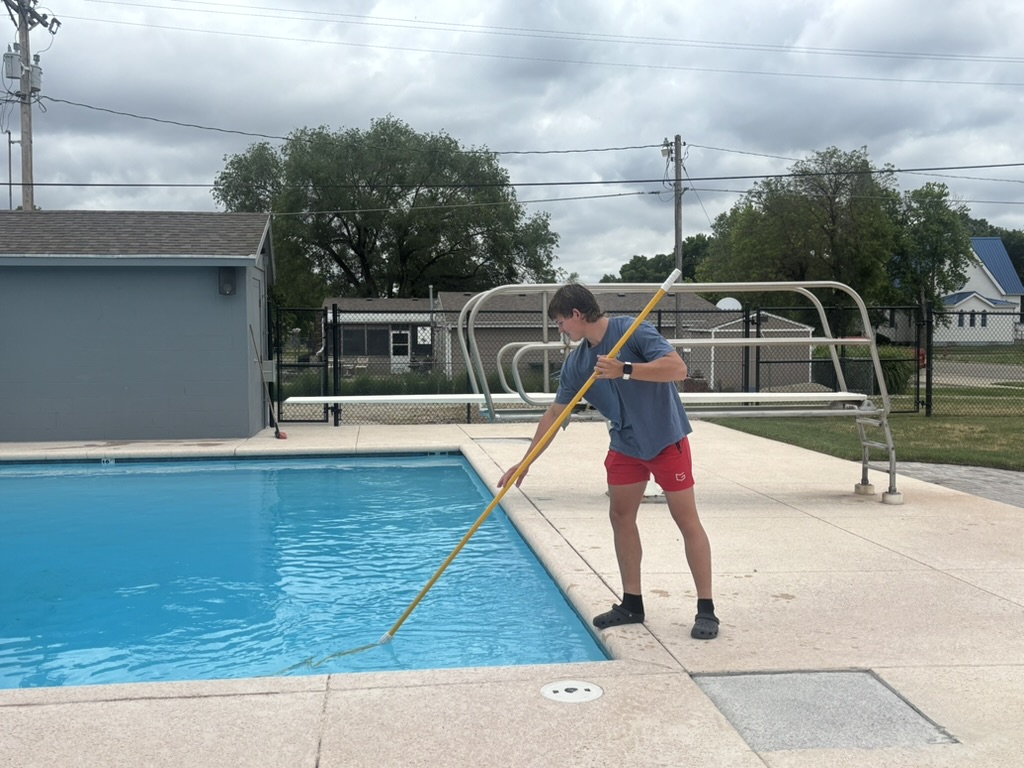 life gurad cleaning the pool 